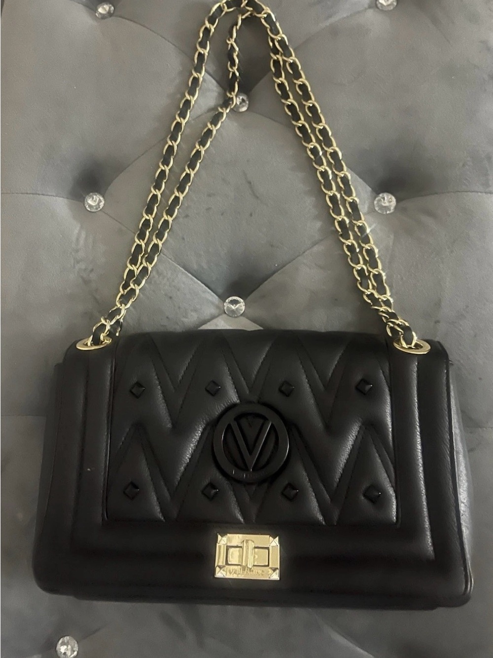 Black Quilted Shoulder Bag with Gold Chain and Logo Accent